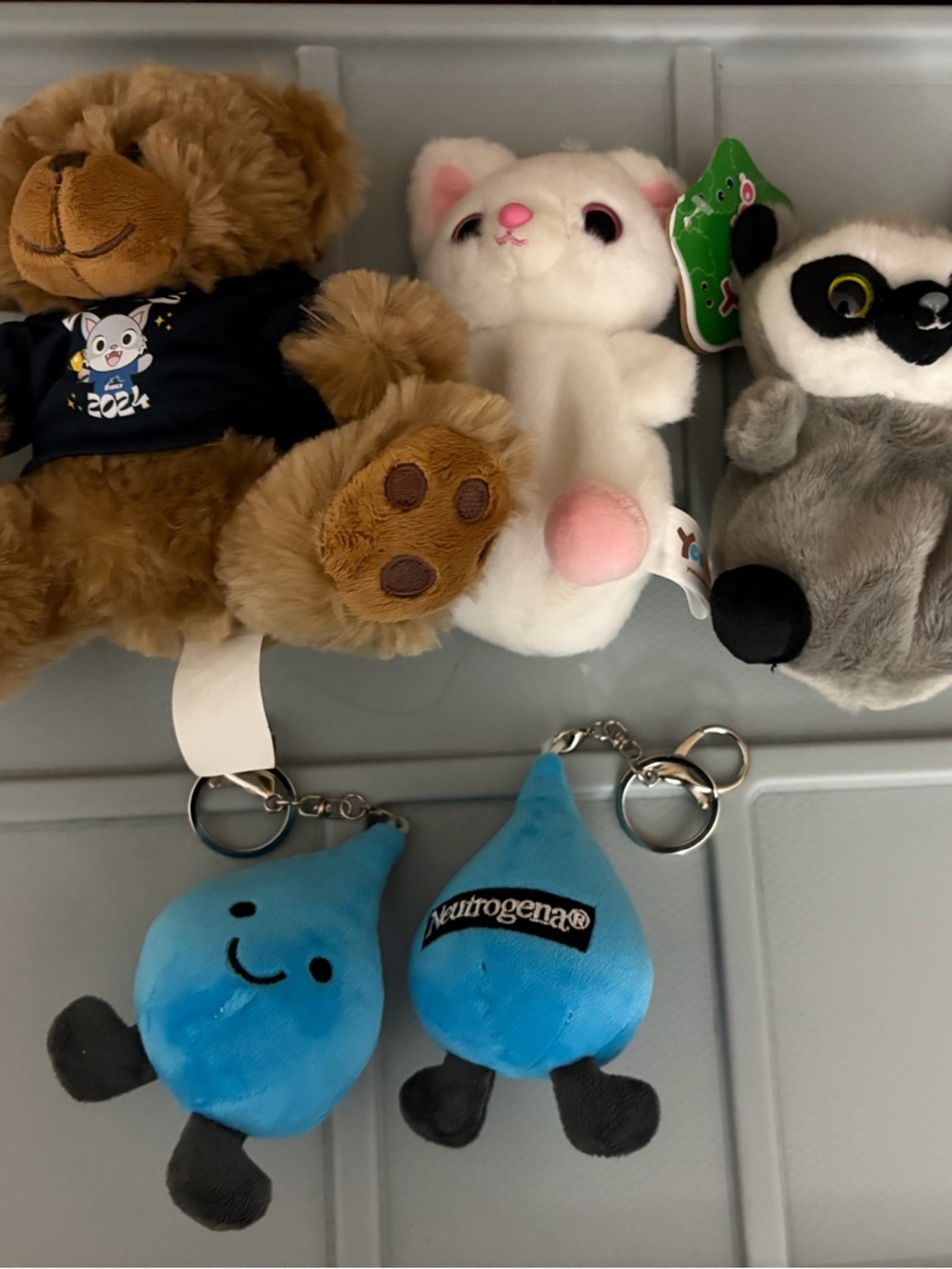 Plush toys and neutrogena Tear drop keychain